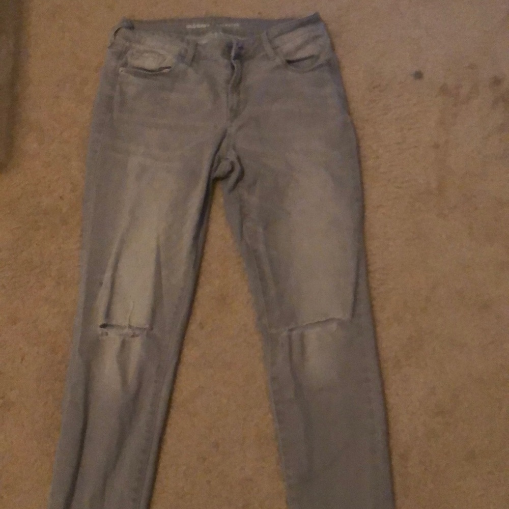 Distressed grey jeans